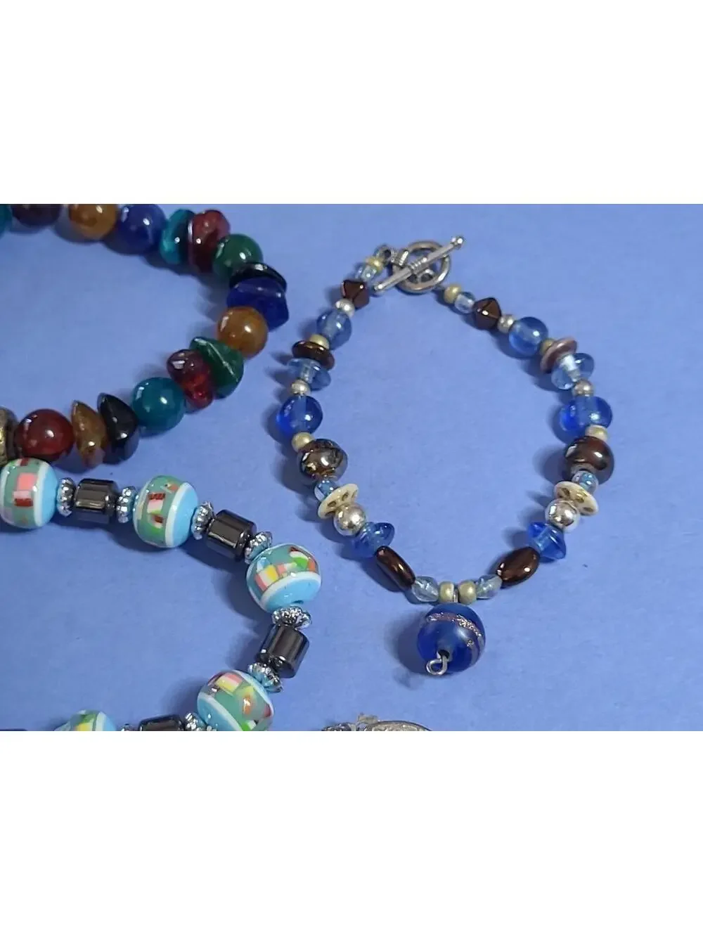 Lot Of 9 Beaded Stretch Braclets. Mixed Stones & Materials
